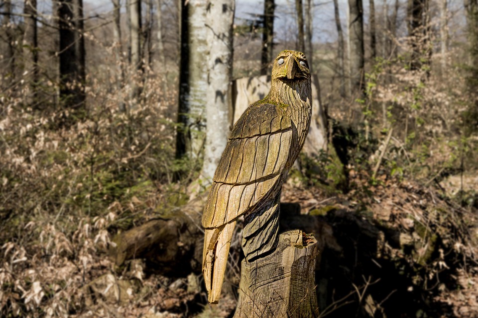 Seasonal Ritual: Harvest Moon’s Embrace Over Corn Pallets