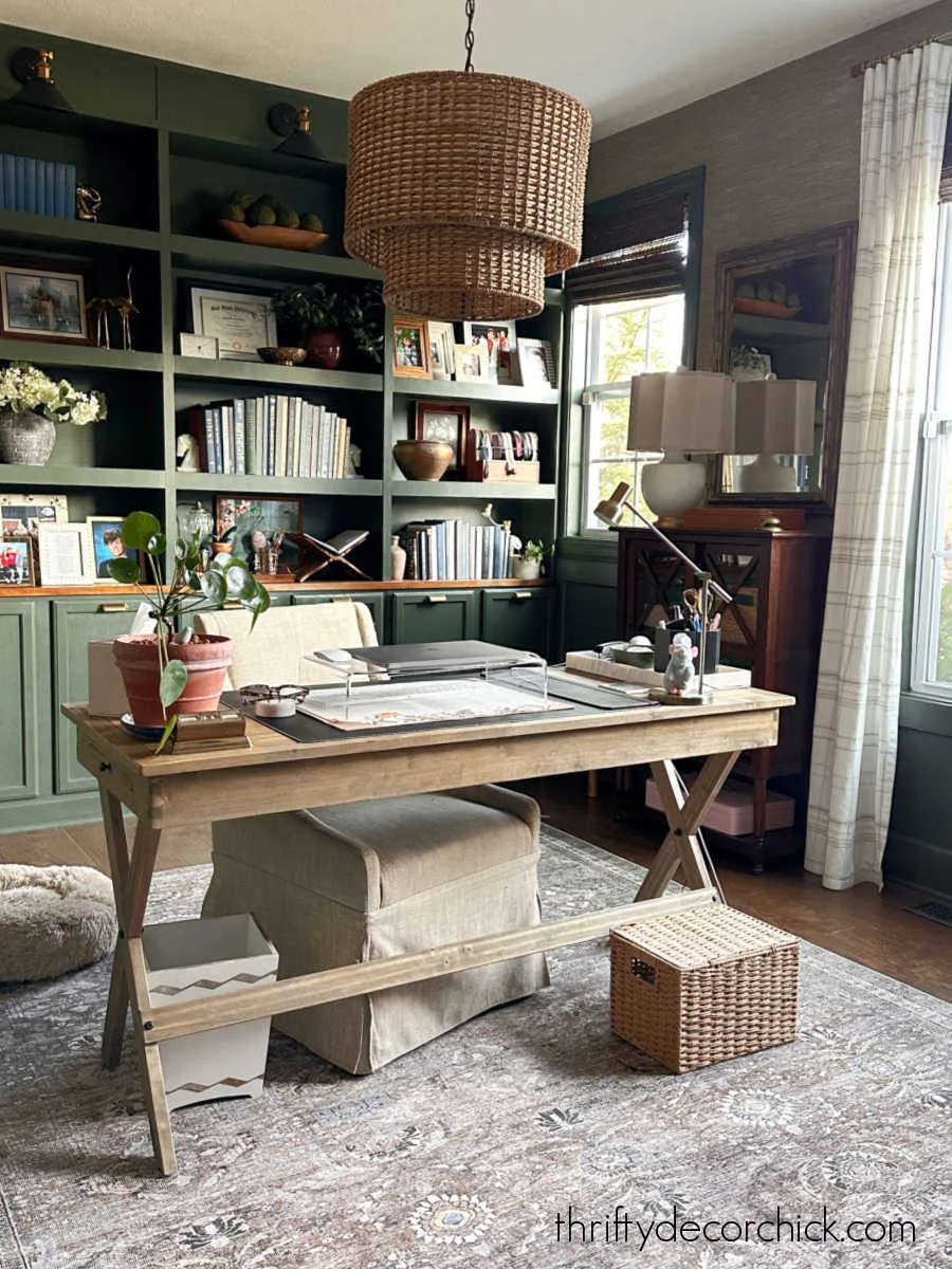 dark green moody office with bookcase