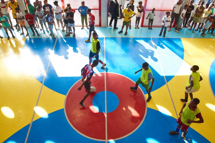 young people playing sports at public venue by empower