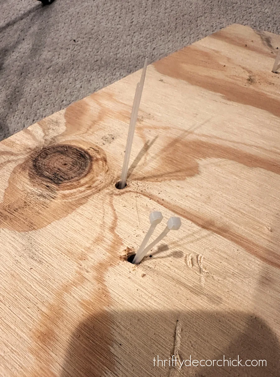 zip ties in wood base