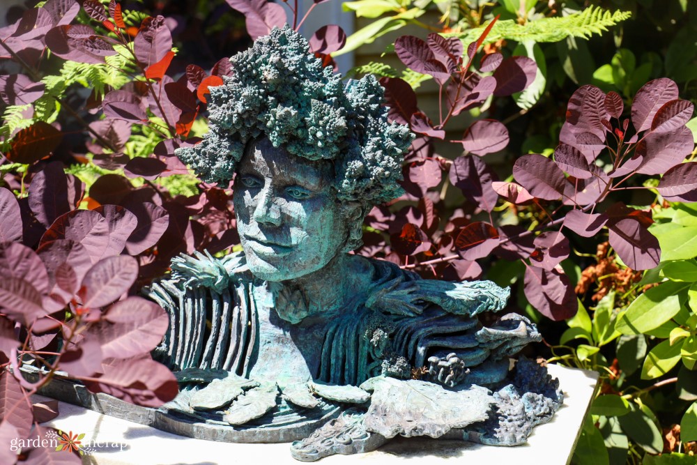 iron head bust sculpture