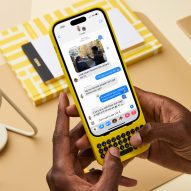 person using iphone with yellow keyboard by clicks technology