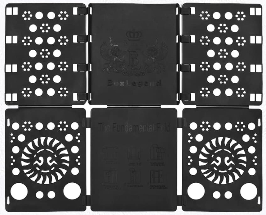 10 unexpected organizing ideas you may not have thought of 6 black plastic shirt folding board with multiple hinge sections, circular holes, and sun face designs on two panels. center panel reads “the fundamental fold” with illustrated folding instructions below.