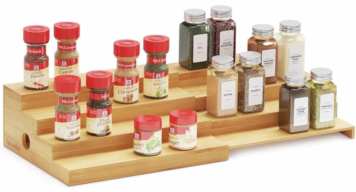 10 unexpected organizing ideas you may not have thought of 13 an organized wooden spice rack holding a variety of labeled spice jars among other organizing products.