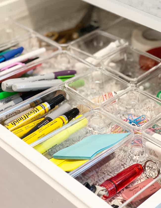 10 unexpected organizing ideas you may not have thought of 15 an open desk drawer revealing a neatly organized collection of organizing products, including pens, markers, sticky notes, and paper clips, sorted into clear compartments.