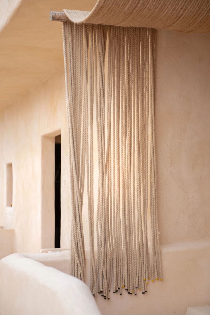 interior designer patricia galdón suspended rope as awnings and curtains on th 23
