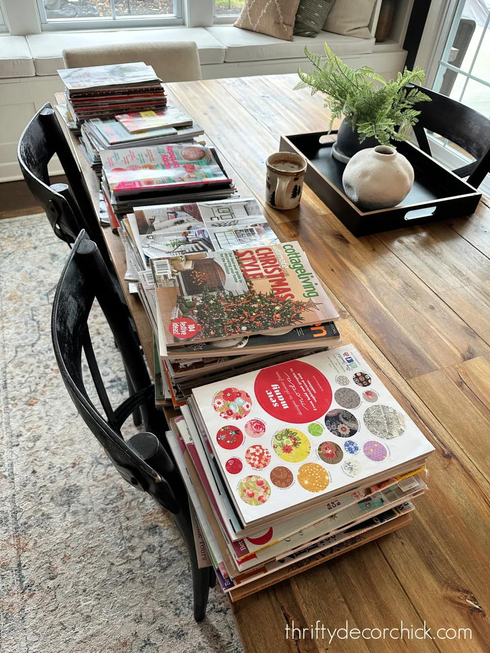 my top five tips that make decluttering much easier | thrifty decor chick 5 stacks of magazines on table