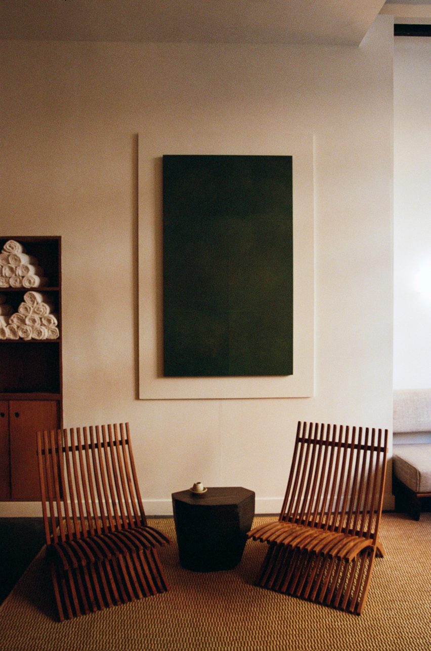 a tabletop laminated in washi paper by hanato wataru repurposed as wall art