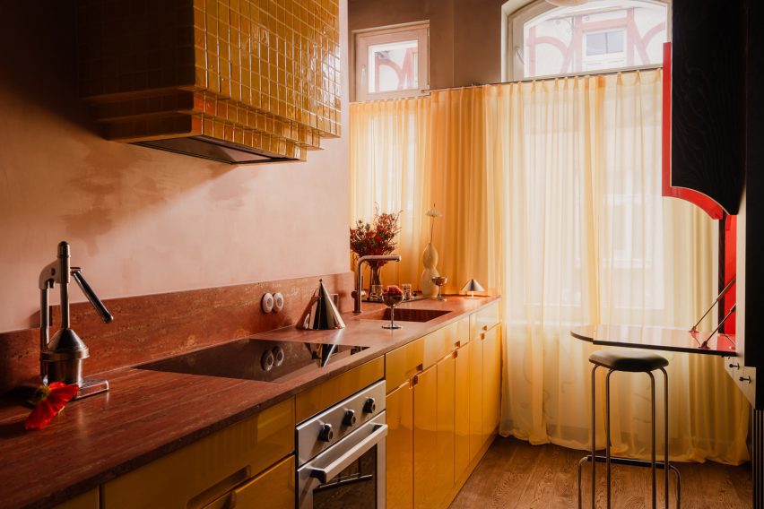 yellow kitchen by coi studio