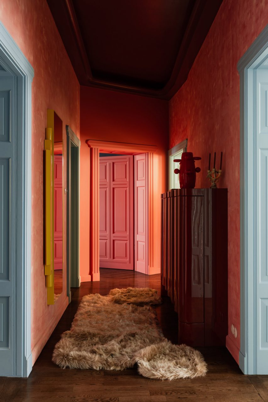 corridor drenched in colour by coi studio