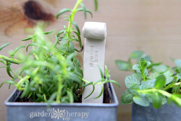 all you need is love clay plant tag