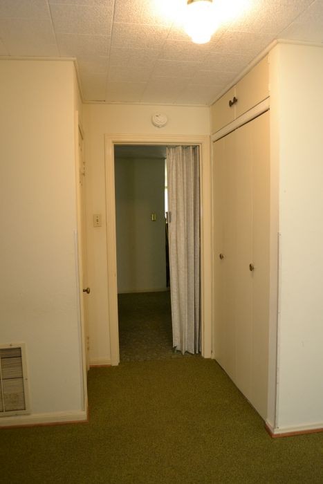 closet in hallway that isn't original to the house