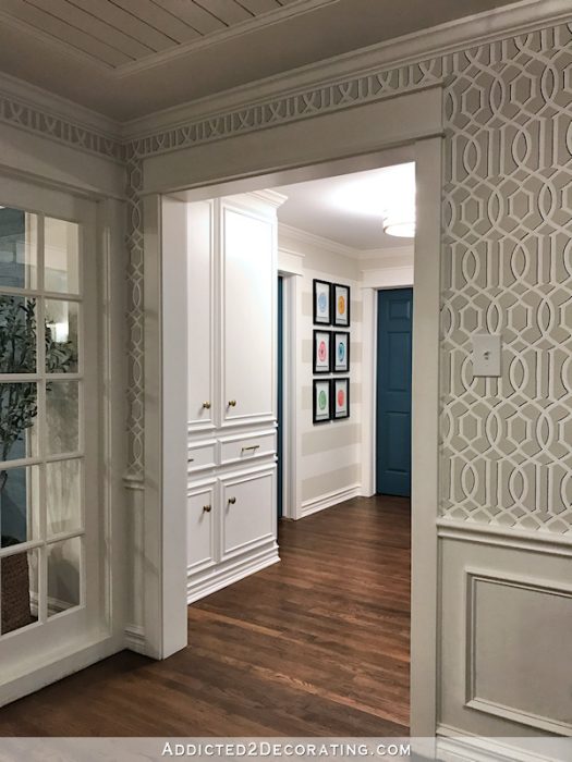 hallway after remodel - custom built-in linen cabinet, view from music room