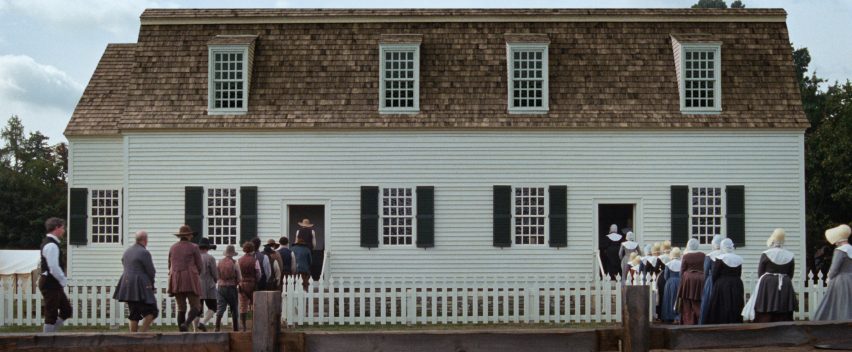 still from the testament of ann lee showing shakers filing into the meeting hall