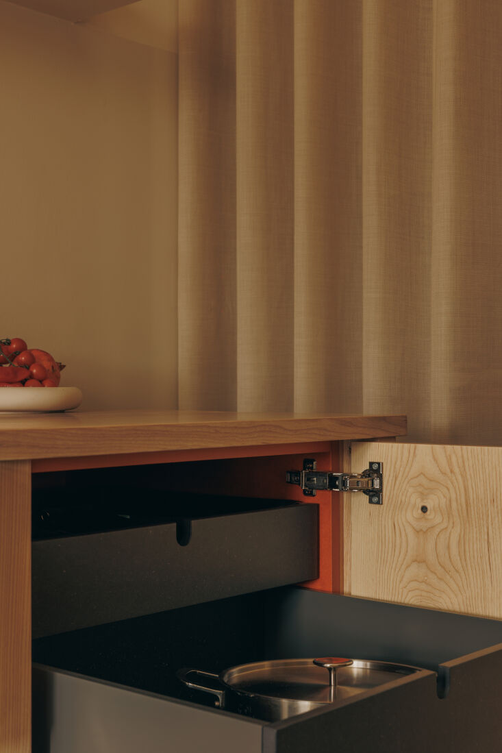 for the cabinet interiors, studio silvan utilized their extra valchromat, a thi 20