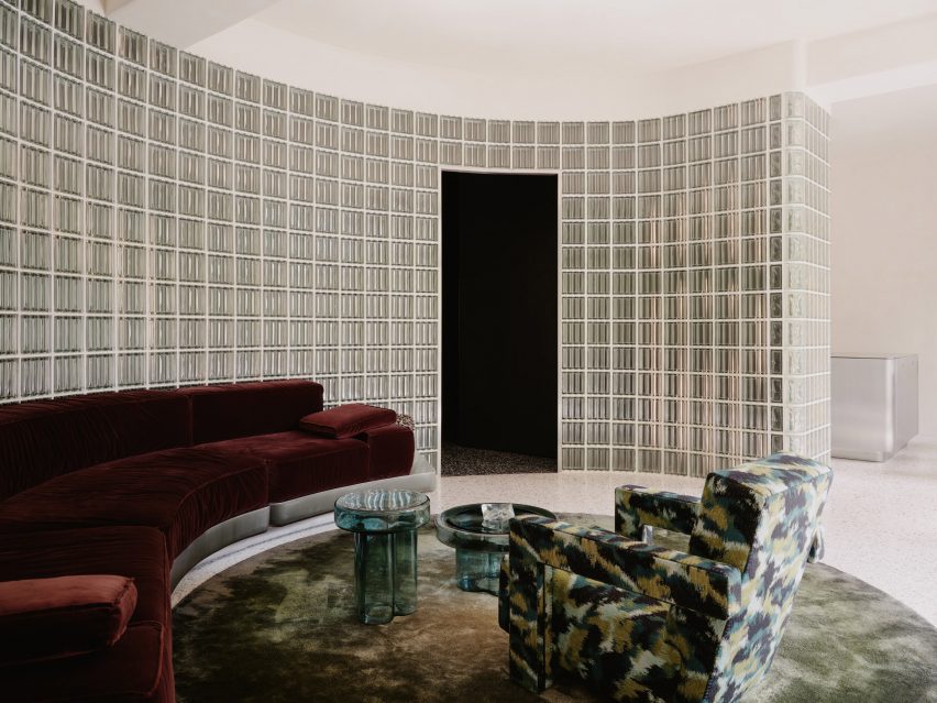 living space with a glass brick wall