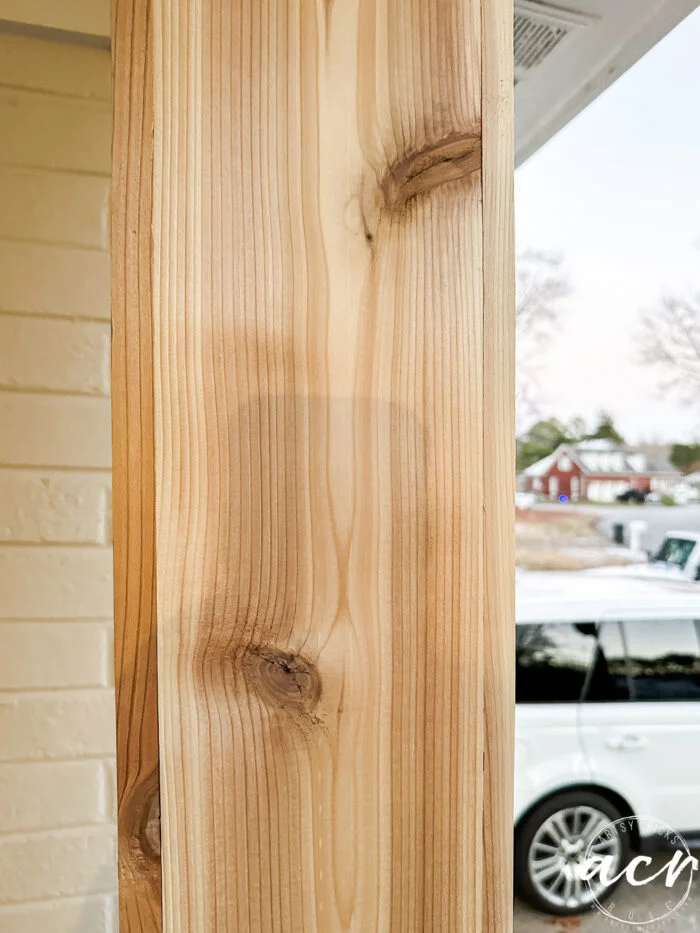 old column fully wrapped with cedar