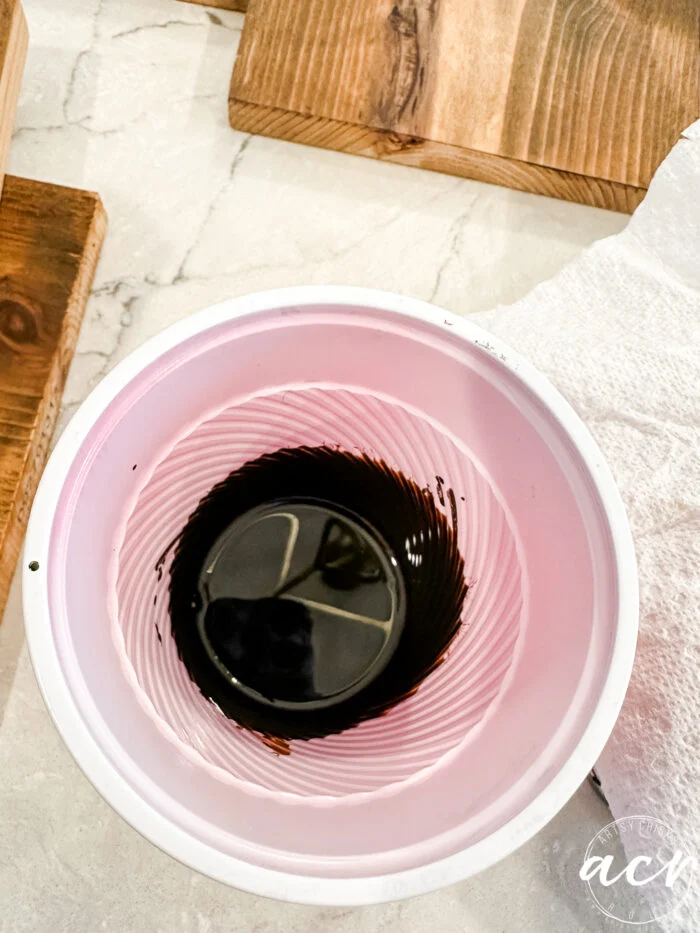 wood stainin a plastic cup