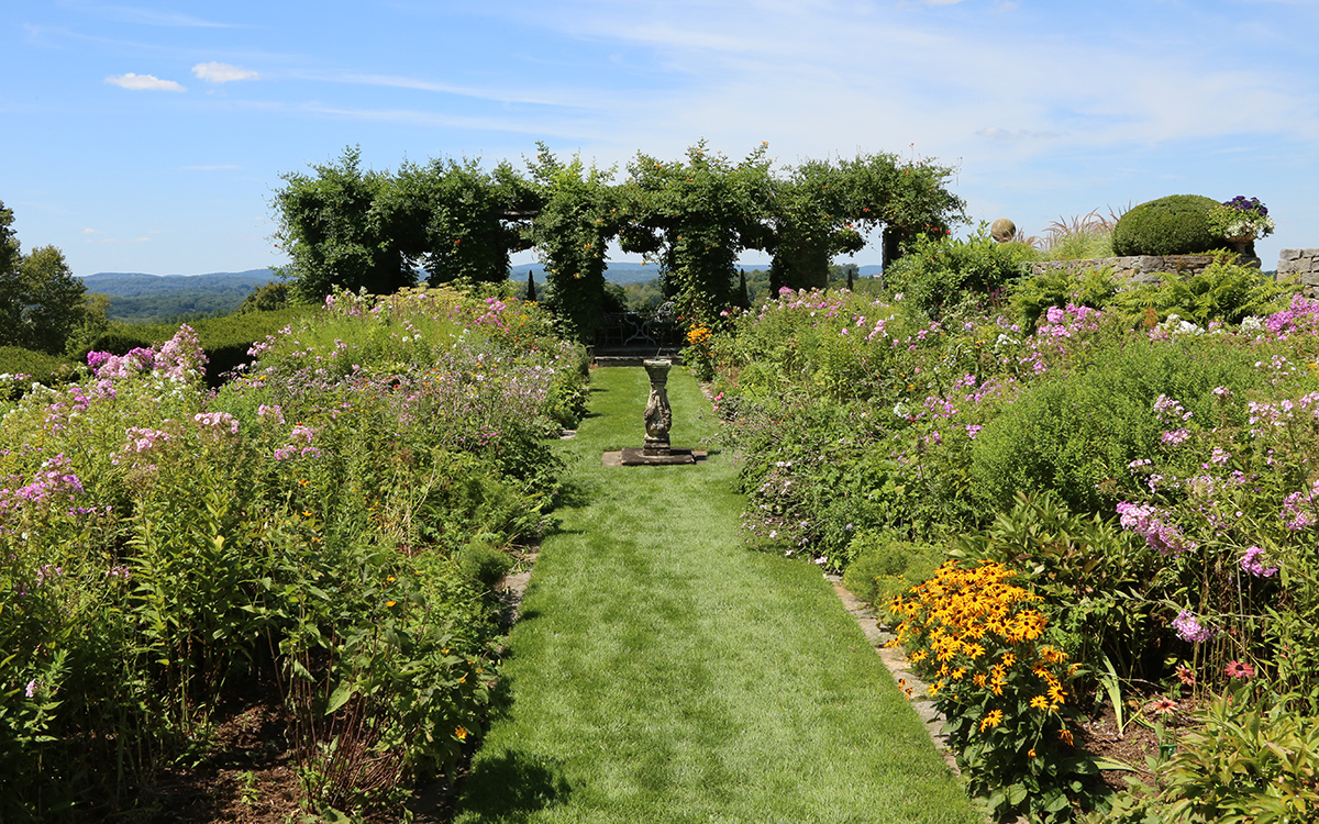 grass paths in colorful perennial garden