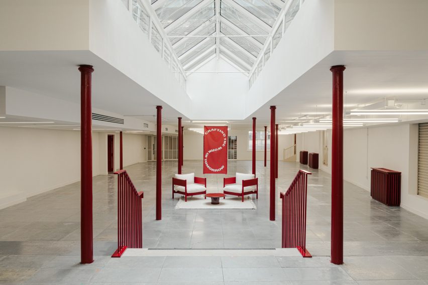 five opportunities in architecture listed on dezeen jobs 3 interior with red columns, railings and seating