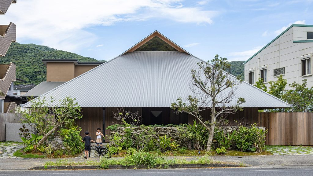 Large metal roof tops off-grid home on Japanese island by Sakai Architects