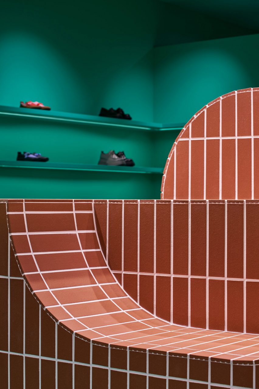 curved tile surface in camper shin maru interior by jorge penadés