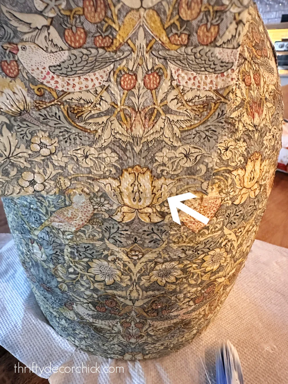 gluing paper napkin on vase