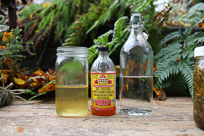 acv next to a jar of water