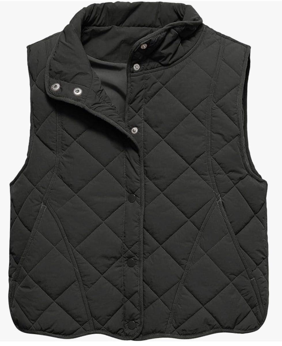 a black, quilted sleeveless vest with a high collar, snap buttons, and diamond-patterned stitching, displayed on a white background.