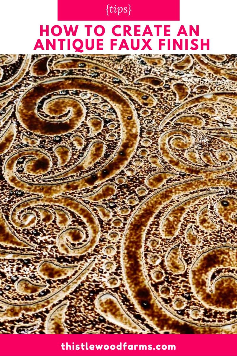 close-up of a textured surface with an ornate, swirling faux antique finish in shades of brown and gold. text above reads, “how to create an antique faux finish.” website thistlewoodfarms.com is at the bottom.