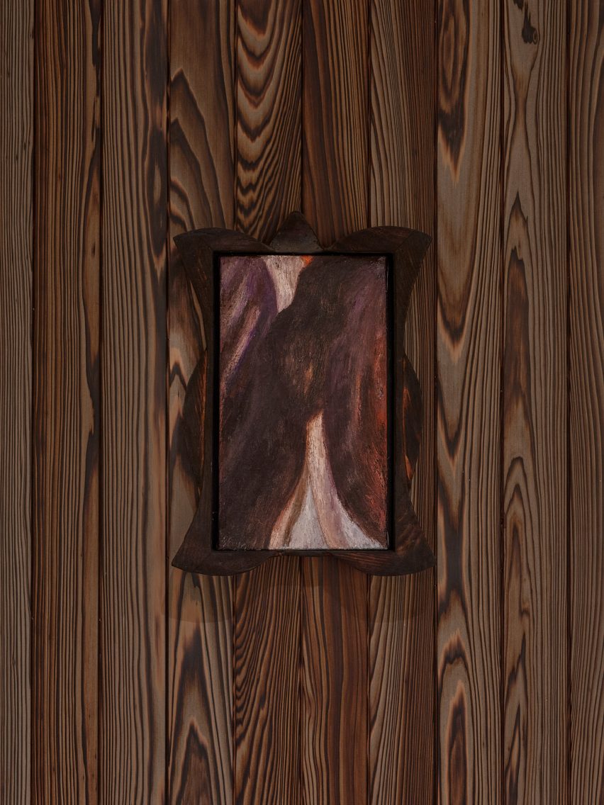 hand-carved frame by kelly wearstler