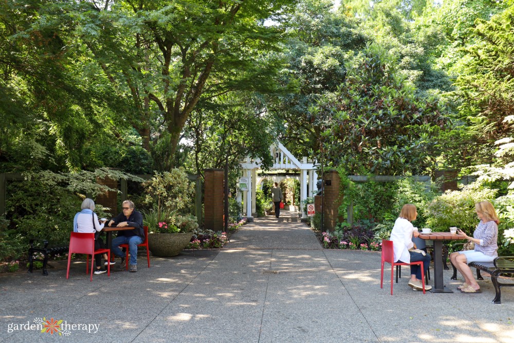 people sitting and drinking coffee in Park and Tilford Garden