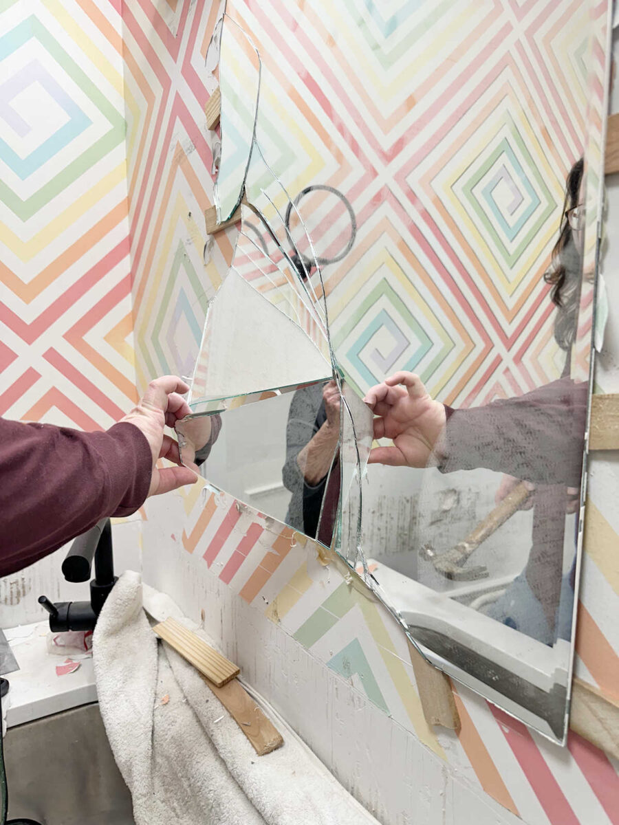 studio bathroom - mirror removal and wall prep 4 using a heat gun and wood shims to remove a bathroom mirror that is glued to the wall