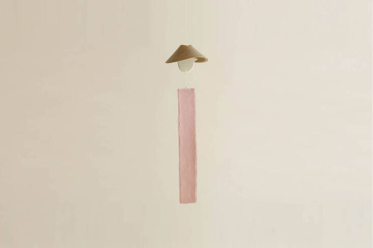 the owara kaze no bon wind chime in brass is made in takaoka city in the toyama prefecture of japan by a company founded in 1609; $75 at santoku nyc, which has a wide selection of japanese-made wind chimes.