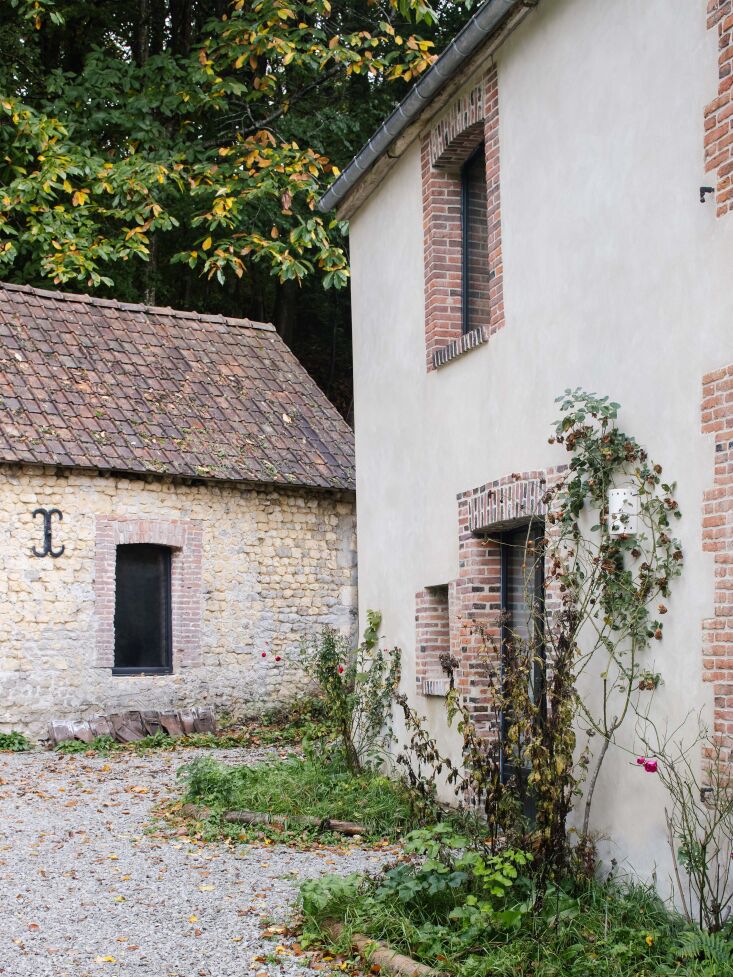 the architects implemented a careful landscape intervention to restore the surr 18