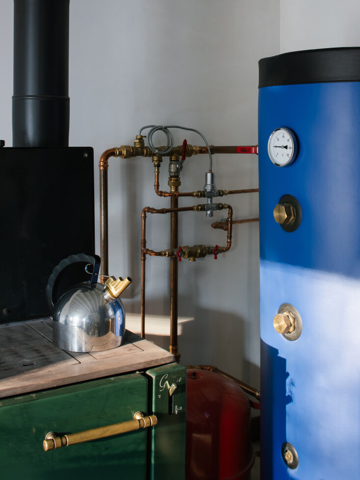 the wood fired boiler stove system is new—heating the cast iron radiators thr 22