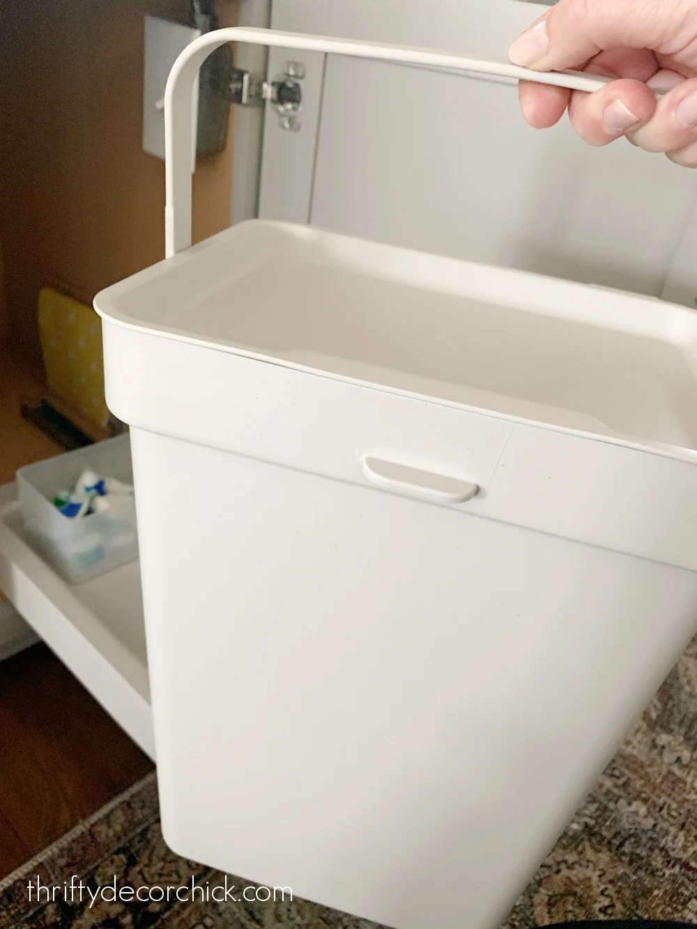 making the most of storage space under the sink | thrifty decor chick 26 ikea pull out trash bins