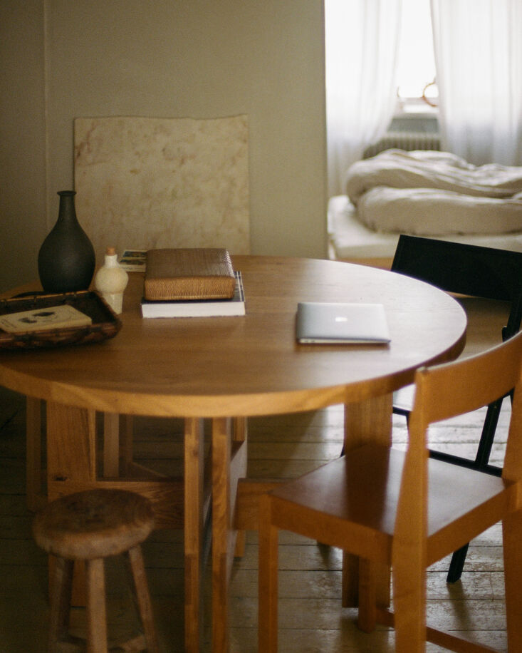 the dining table is the frama farmhouse trestle table in oak paired with a fram 21