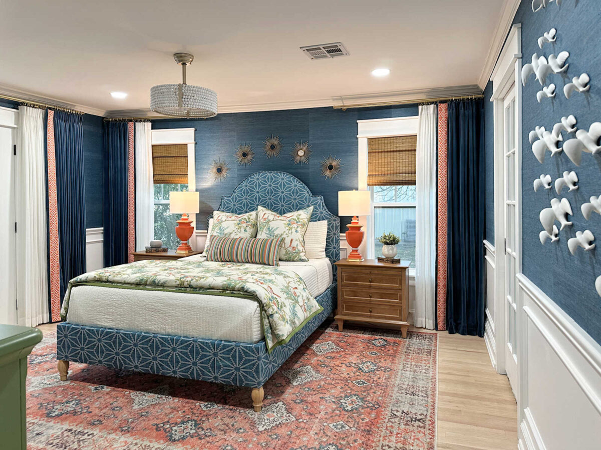 bedroom remodel - after -- with teal grasscloth wallpaper, a diy upholstered headboard and bed base, orange accents