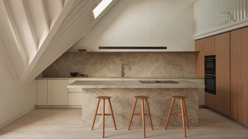 Mata Architects expands Vaulting Loft flat with “cathedral-like” roof