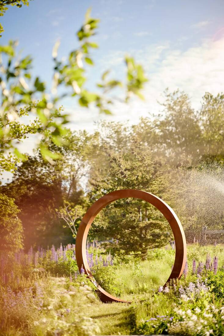 the weathering steel moon gate in corten steel comes in two sizes; from $2,598 at terrain.