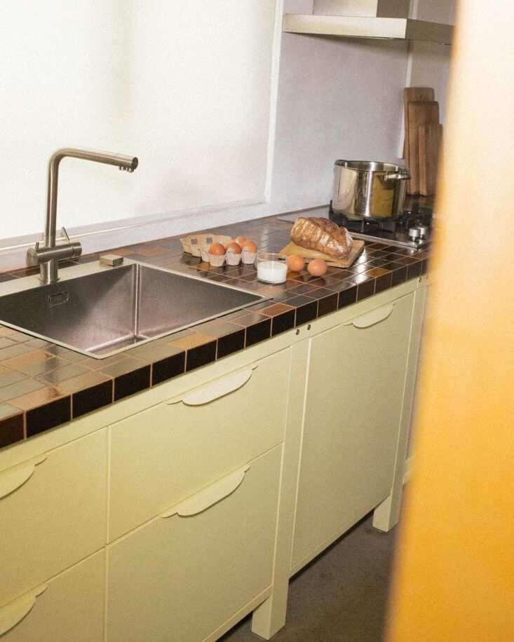 a franke faucet and stainless steel sink. 21