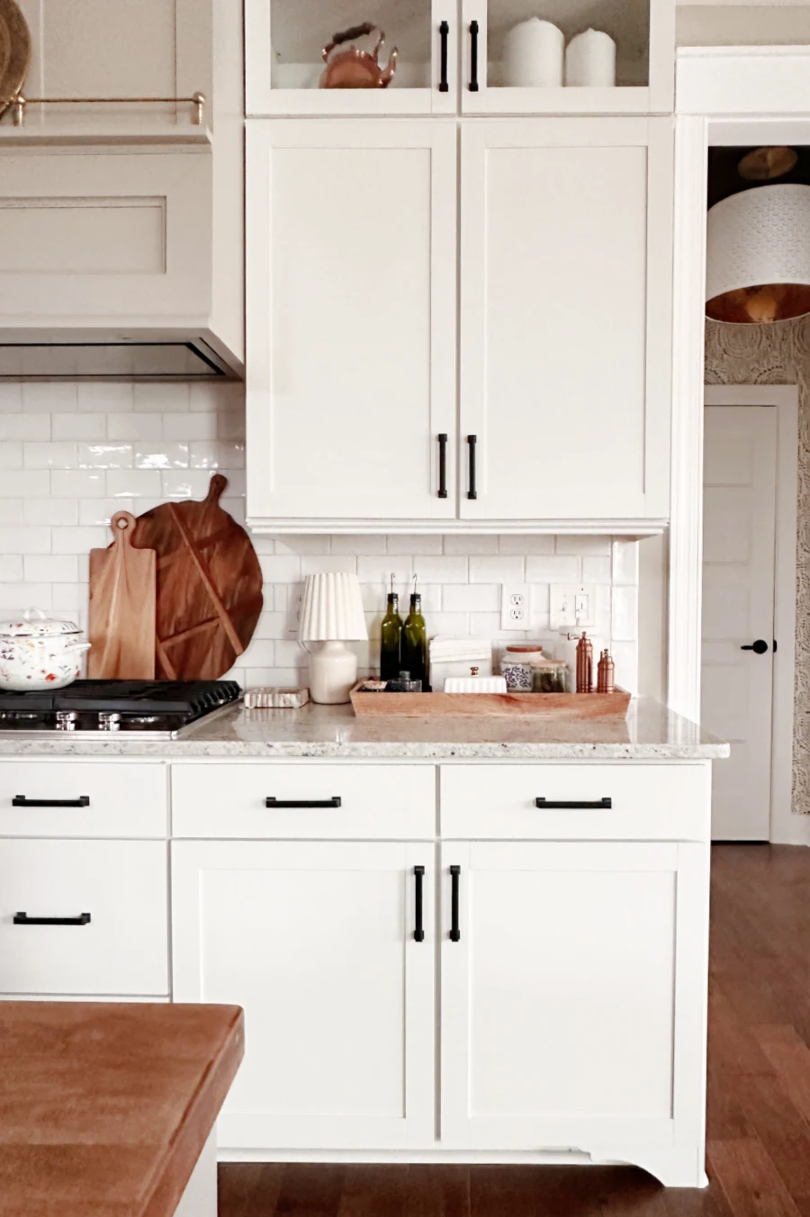 white cabinets white backsplash