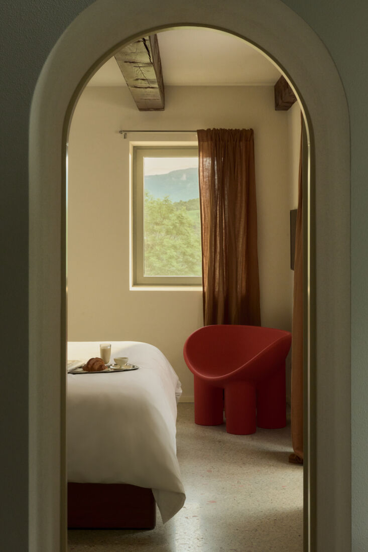 a faye toogood designed roly poly chair in red poly for driade brings a strong  22