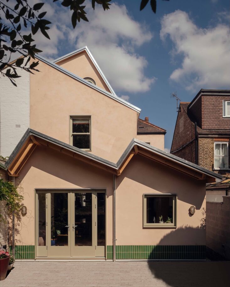 above: out back things zig and zag. the multi story addition houses a new kitch 19