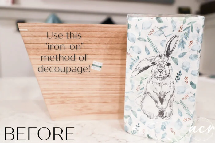 a wooden box and a rectangular object with a rabbit and leaves sketch sit on a counter. text reads, use this iron-on method of decoupage! discover how to decoupage with the iron on method. the word before appears at the bottom.