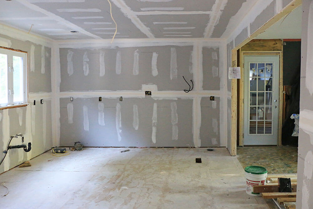 room being renovated. drywall that is unfinished.