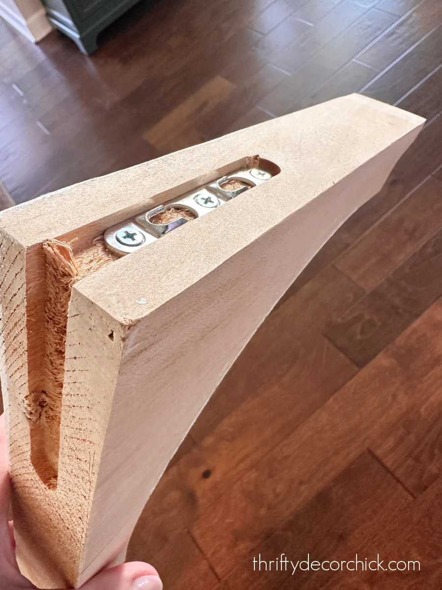 how to update basic cabinets with diy furniture feet | thrifty decor chick 2 metal brackets on wood corbels