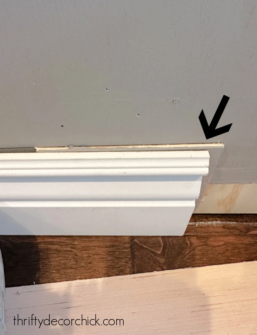 how to add custom diy details to a builder basic kitchen island | thrifty decor chick 2 thick tall baseboards with curves