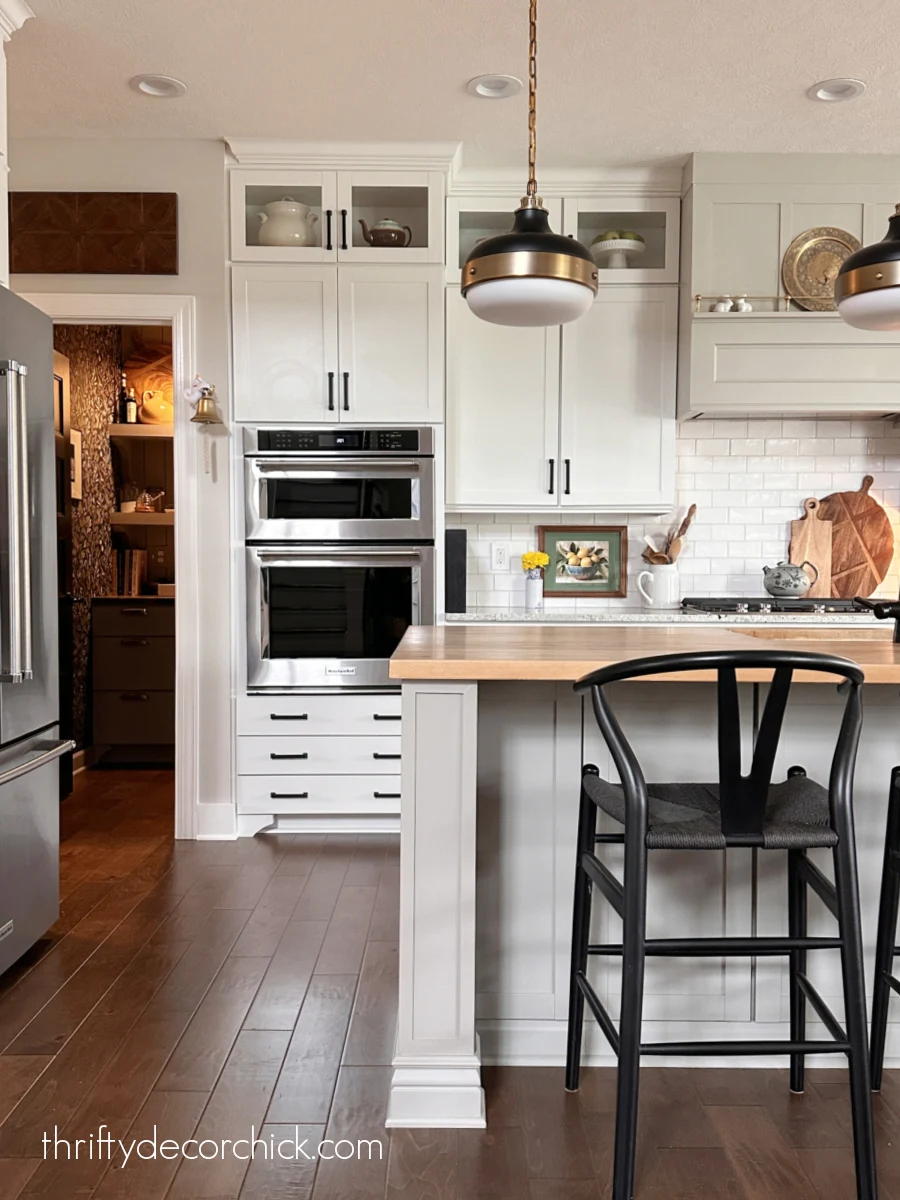 how to add custom diy details to a builder basic kitchen island | thrifty decor chick 11 island with sides that extend the width